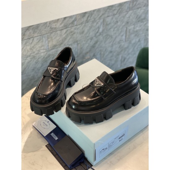 Prada Monolith Loafers Front Perspective in black Front high-angle perspective of Prada black brushed leather Monolith loafers