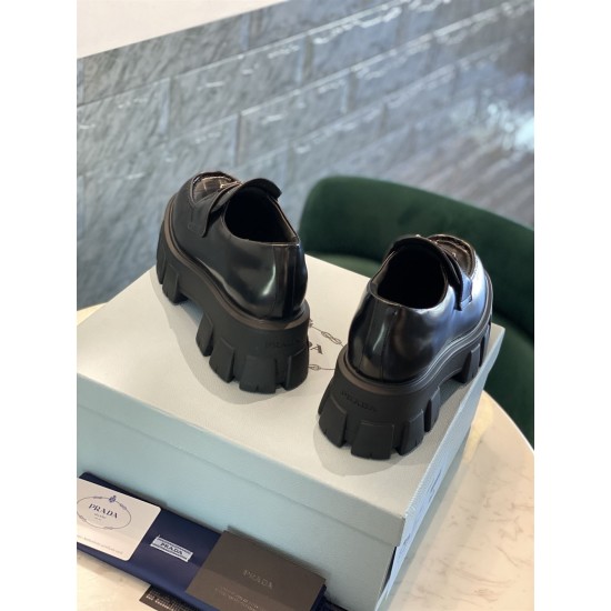 Prada Monolith Loafers Heel View in black Rear angle view of Prada Monolith loafers highlighting heel contours and lugged soles in black