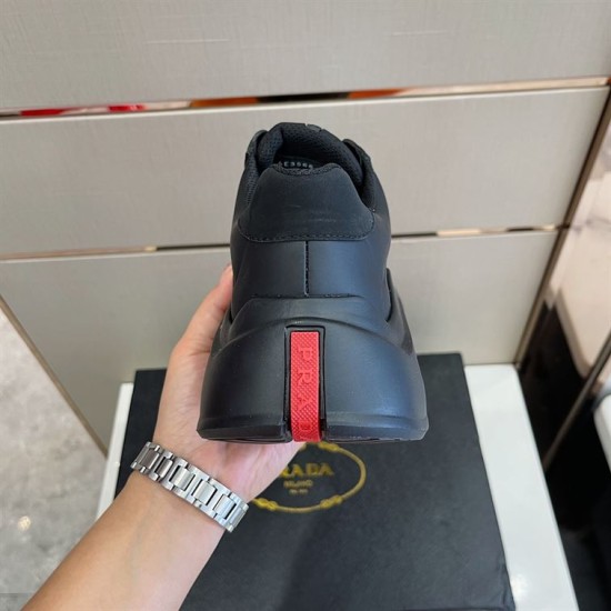 Prada Polarius Black Trainer Heel Detail in black and white Rear view showing black heel cup and signature red vertical logo stripe in black and white