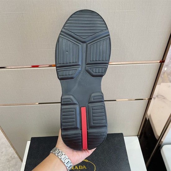 Prada Polarius Trainer Outsole Detail in black and white Underneath view displaying the tread design and red accent on black trainer sole in black and white