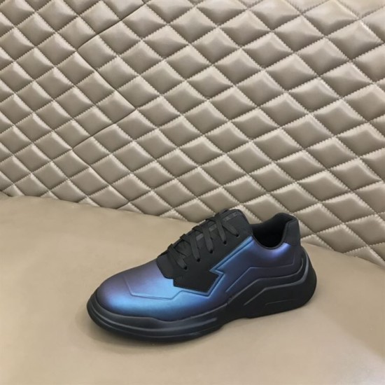 Prada Iridescent Blue Low Top Trainers Outer Profile in blue and white Prada Iridescent Blue Low Top Trainers resting on a beige padded surface in blue and white