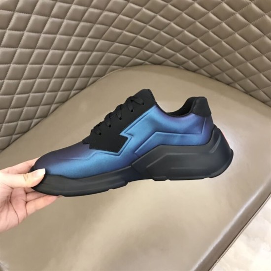 Prada Iridescent Blue Low Top Trainers Medial View in blue and white Hand holding Prada Iridescent Blue Low Top Trainers showing the medial side profile in blue and white