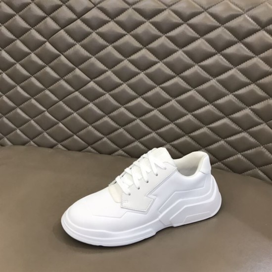 Prada White Leather Trainer Angled Side View Angled side view showing the sculpted sole of Prada white leather trainer
