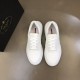 Prada White Leather Trainers Top View Top-down view of Prada white leather low top trainers showing red inner soles