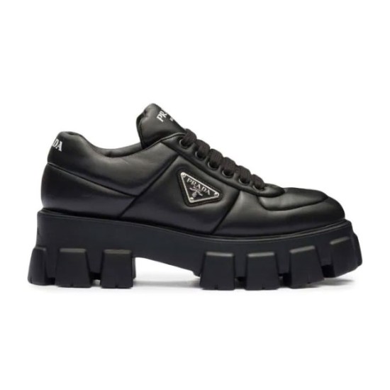 Prada Soft Padded Black Nappa Leather Trainer Side View Side profile of Prada soft padded nappa leather chunky sole trainer in black featuring thick lug sole and triangle logo