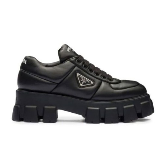 Prada Black Chunky Sole Leather Trainer Studio View Full side view of black Prada soft padded nappa leather trainer with chunky platform sole against white background