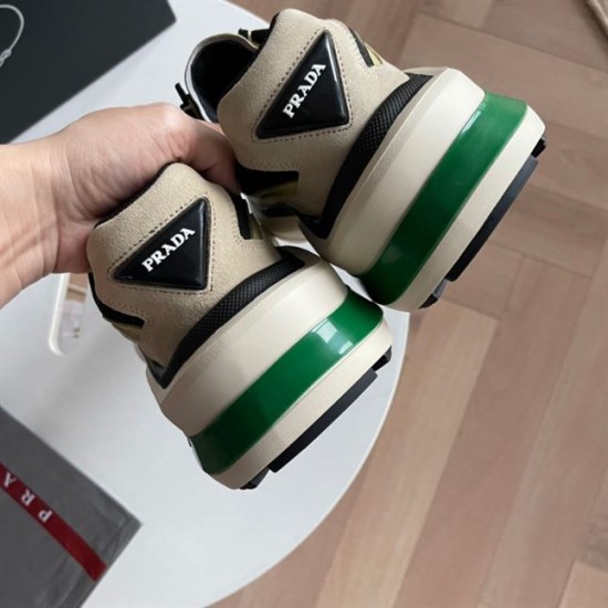 Prada Systeme Yellow Trainers Triangle Logo Heel View Heel view showing triangular logo on Prada Systeme yellow trainers