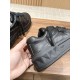 Valentino One Stud XL Black Leather Trainer Heel Detail Close-up of heel counter and stud-embossed midsole on Valentino One Stud XL black trainer