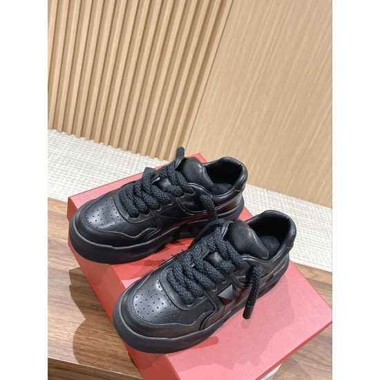 Valentino One Stud XL Black Leather Trainers Packaging View Pair of Valentino One Stud XL black trainers sitting atop a red shoe box