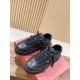 Valentino One Stud XL Black Leather Trainers Packaging View Pair of Valentino One Stud XL black trainers sitting atop a red shoe box