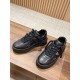 Valentino One Stud XL Black Leather Trainers Pair View Pair of Valentino One Stud XL black leather trainers placed on wooden tabletop