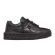 Valentino One Stud XL Black Leather Trainers Side View Side view of Valentino One Stud XL black leather trainers showing chunky platform sole