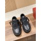 Valentino One Stud XL Black Leather Trainers Front Angle Front elevated view of Valentino One Stud XL black trainers with thick woven laces