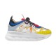 Versace Chain Reaction Trainers Side View in yellow and white Side profile view of Versace Chain Reaction Baroque Pattern Chunky Sole Trainers featuring yellow toe cap and white chain-link sole