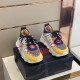 Versace Chain Reaction Trainers Pair View in yellow and white Pair of Versace Chain Reaction Baroque Pattern Chunky Sole Trainers resting angled on top of shoebox in yellow and white