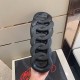 Underside view of Versace Chain Reaction black trainer chain-link tread pattern
