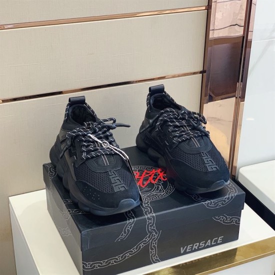 Front view of Versace Chain Reaction black trainers showing patterned laces and mesh toe