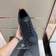 Versace Greca Labyrinth Black Trainer Upper Detail Handholding Versace Greca Labyrinth Black Leather Trainer showing front profile and upper construction