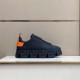 Versace Greca Labyrinth Black Trainers Profile View Side view of Versace Greca Labyrinth Black Leather Trainers with contrast orange heel