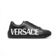 Versace Greca Logo Black Leather Low Top Trainer Profile in black and white Full side view of Versace Greca Logo black leather low top trainer against a white background
