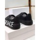 Versace Black Leather Trainers Heel View in black and white Rear heel view of Versace black leather trainers highlighting the tonal heel tab and Greca sole pattern in black and white