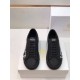 Versace Black Leather Low Top Trainers Front View in black and white Front view of black Versace trainers with flat laces and branded tongue patch in black and white