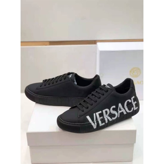 Versace Black Leather Trainers Perspective View in black and white Side perspective of black Versace leather trainers displaying the textured toe bumper in black and white