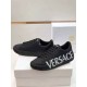 Versace Black Leather Trainers Perspective View in black and white Side perspective of black Versace leather trainers displaying the textured toe bumper in black and white
