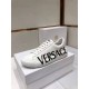 Versace Greca Logo Low Top White Leather Trainers Lateral Profile Lateral side view of white leather Versace trainer with bold lettering