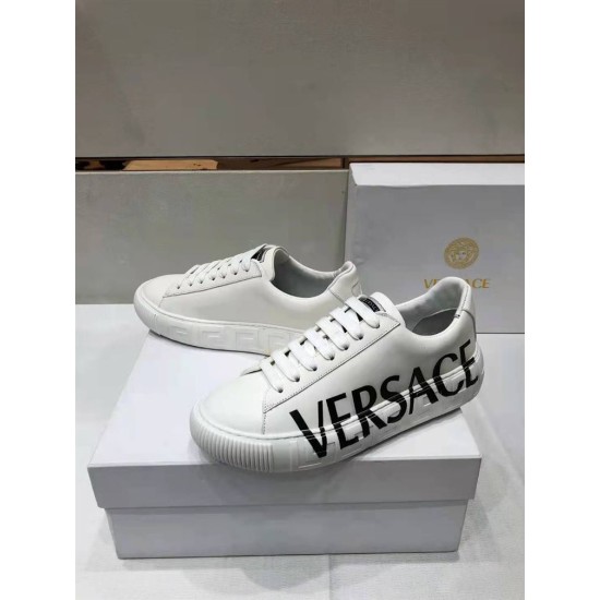 Versace Greca Logo Low Top White Leather Trainers Front View Front perspective of white leather Versace trainers with black logo