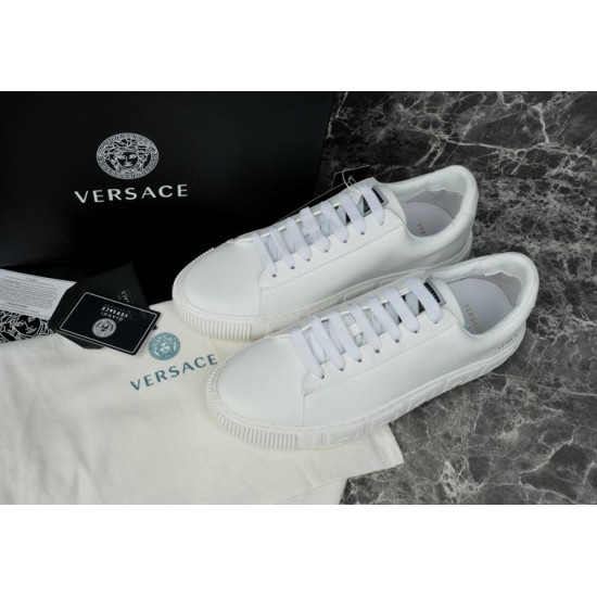 Versace White Trainers Front Quarter View Front quarter view of Versace white low top leather trainers