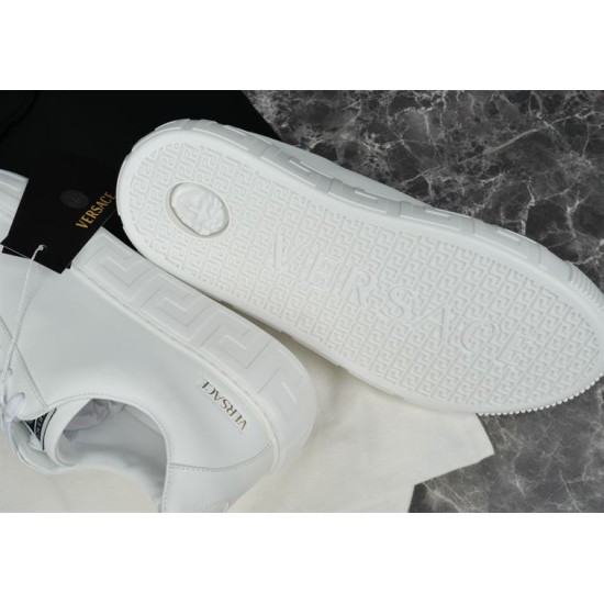 Versace White Trainer Rubber Outsole View Underside view of Versace white trainer outsole showing tread design