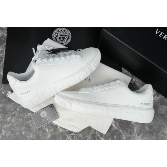 Versace White Trainers Pair View Pair of Versace white low top trainers presented with dust bag