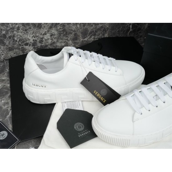 Versace White Leather Trainers Display Pair of Versace white leather trainers displayed with branded tags