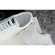 Versace White Trainer Heel Detail Close-up view of heel counter and tongue branding on white Versace trainer