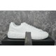 Versace White Trainer Side Profile View Versace white leather low top trainer resting on shoebox with brand tag