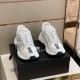 Versace Trigreca White Trainers Pair in white and gold Pair of white Versace Trigreca trainers displayed on black shoe box front view in white and gold