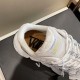 Versace Trigreca Inner Cork Sole in white and gold Close-up of cork inner sole and padded collar inside white Versace trainer in white and gold
