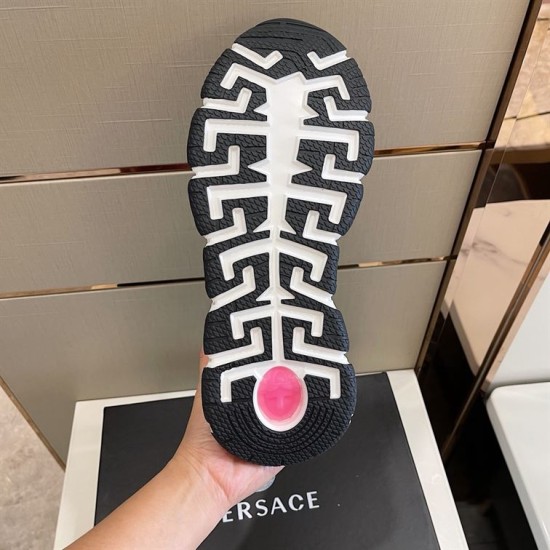 Versace Trigreca Outsole Tread in white and gold Bottom outsole view of white Versace Trigreca trainer showing black Greca tread pattern in white and gold