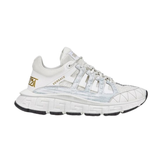 Versace Trigreca White Trainer Side View in white and gold Profile view of Versace Trigreca white low top leather trainer showing gold logo and Greca midsole
