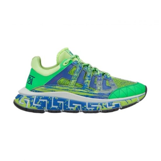 Isolated side view of the green and blue low-top trainer on a white background