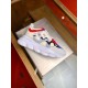 Versace Chain Reaction Elevated Side View in white and red Elevated side view of white and red printed Versace Chain Reaction low top trainers