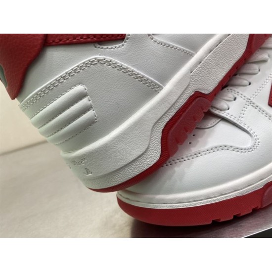 Close-up of stitched leather heel counter and textured midsole in off-white and white