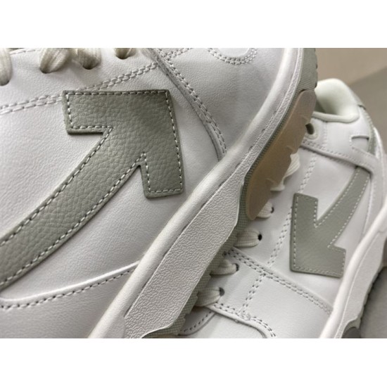 Off-White Out Office Trainers Arrow Applique Detail Close-up of grey leather arrow applique on Off-White Trainers