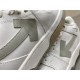 Off-White Out Office Trainers Arrow Applique Detail Close-up of grey leather arrow applique on Off-White Trainers