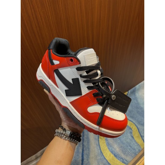 Handheld angle showing red panelled upper and black arrow logo on Off-White Out Of Office Ooo Trainers