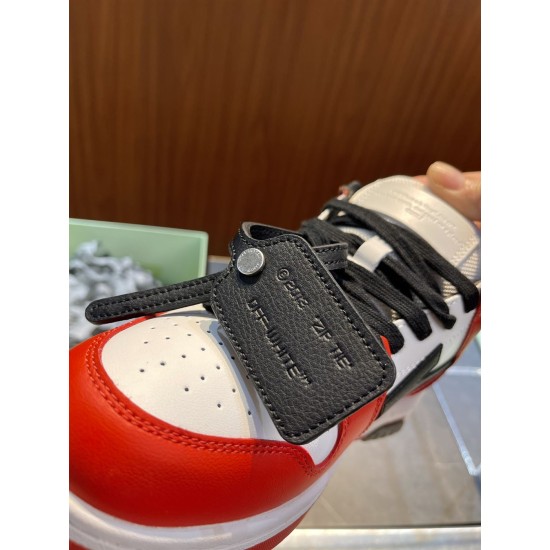 Close-up view of black leather zip tie tag on Off-White Out Of Office Ooo Trainers in off-white and red