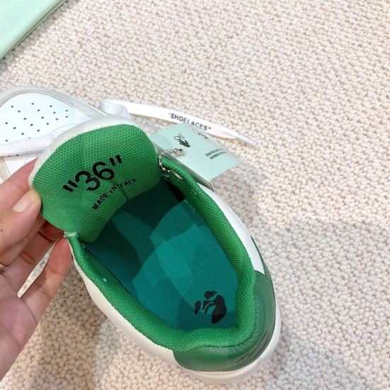 Off-White Out Of Office Trainer Interior Detail Close-up of green inner lining and tongue label size print in off-white and white