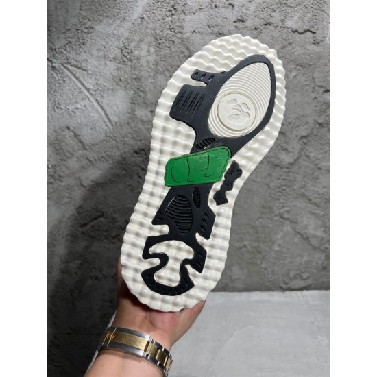 Underside view showing tread pattern of Off-White Sponge Mid-Top Trainers in off-white and black