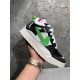 Handheld side view showcasing the textured sole of Off-White Sponge Mid-Top Trainers in off-white and black